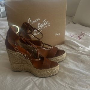 Christian Louboutin wedges, perfect for Summer, or any occasion. Worn once.